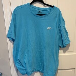 The Nike Tee light blue